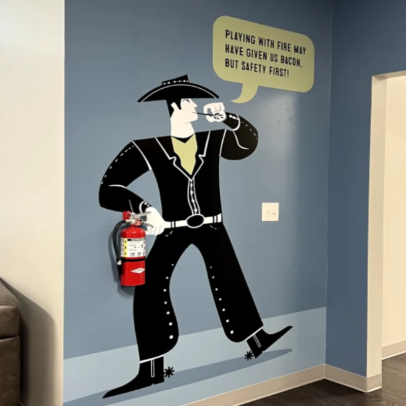 Cowboy vinyl wall graphic for branded environment by Uptimize