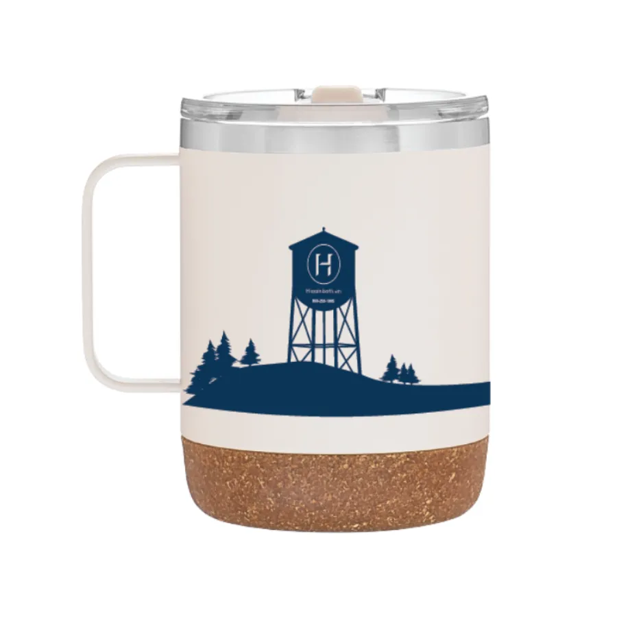 Higginbotham cork-bottom travel mug in cream with a navy water tower and pine tree silhouette