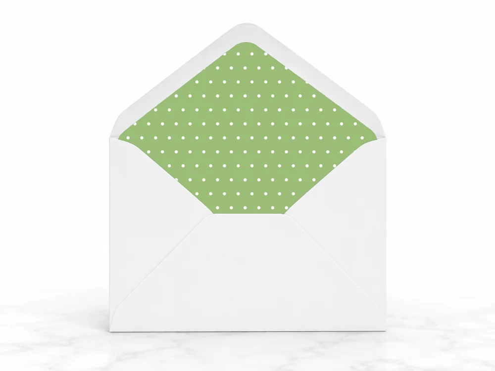 Strategic Employment Solutions custom-lined envelope with a sage-green and white polka-dot interior pattern