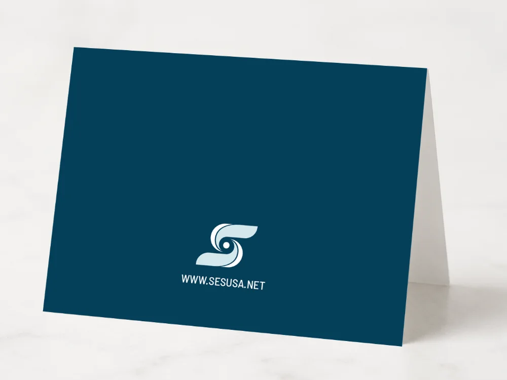 Back of the Strategic Employment Solutions custom greeting card in navy with the refreshed S mark and the sesusa.net URL