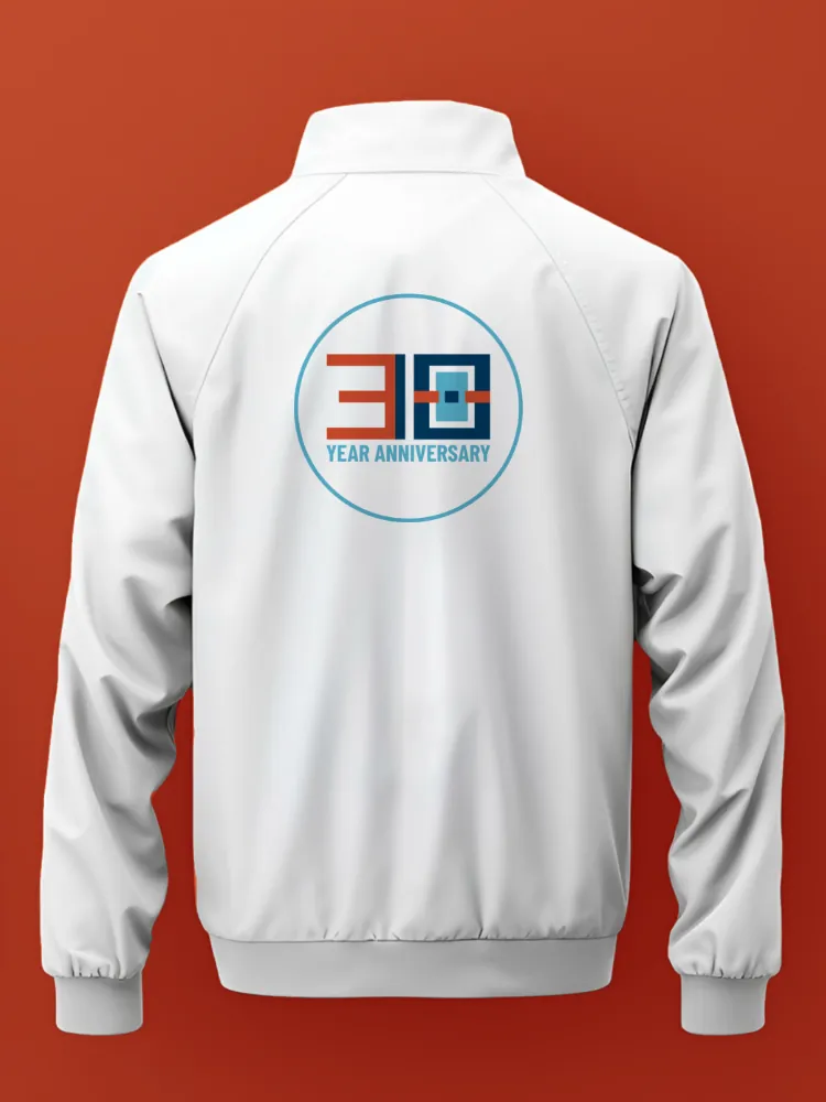 Tardy Orthodontics 30-year anniversary white jacket with the custom 30-year anniversary mark integrated into the bracket monogram